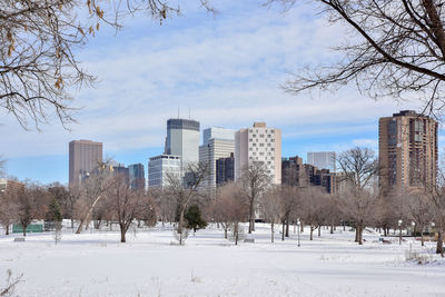 Buildings in city against sky