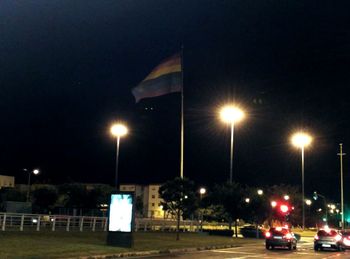 Illuminated street light at night