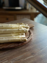 High angle view of bread on cutting board