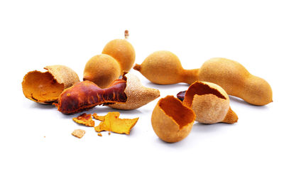 Close-up of cake against white background