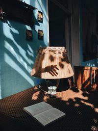 Shadow of cat on table by building