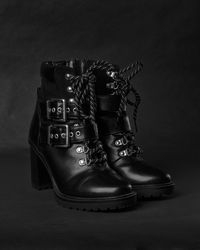 High angle view of shoes on table against black background