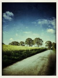 Country road passing through landscape