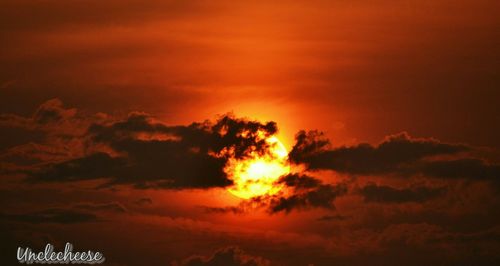 Scenic view of dramatic sky during sunset