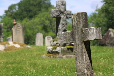 Stone cross in cemetery