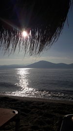 Scenic view of sea against clear sky during sunset