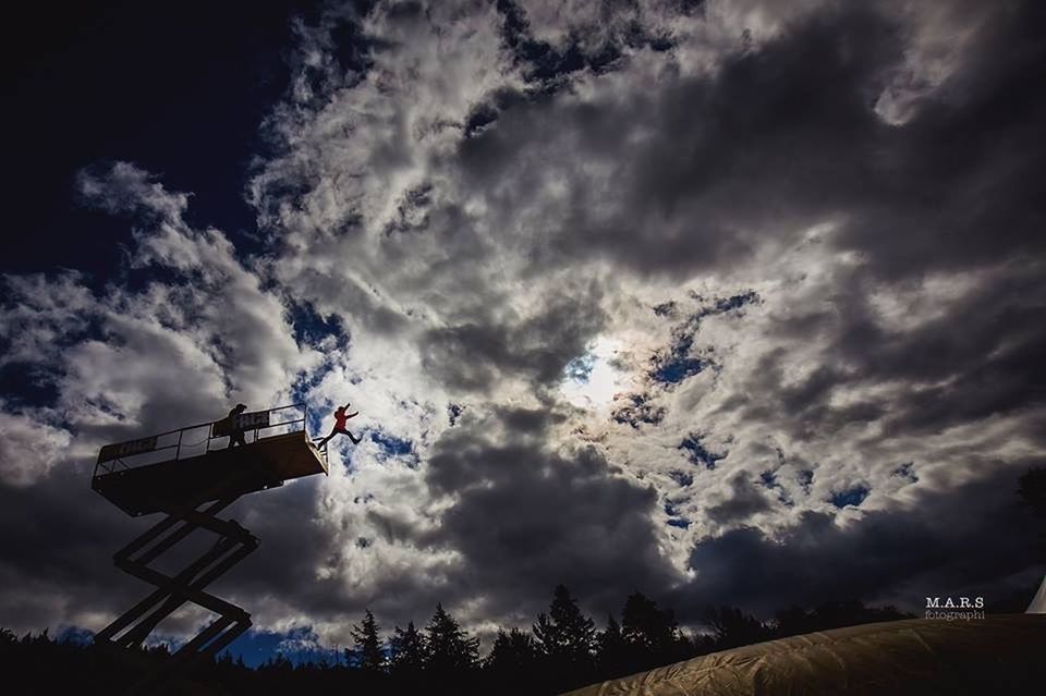 sky, low angle view, cloud - sky, cloudy, weather, silhouette, overcast, cloud, storm cloud, dusk, nature, street light, outdoors, dramatic sky, beauty in nature, cloudscape, built structure, no people, tranquility, tree