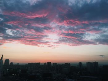 City lit up at sunset