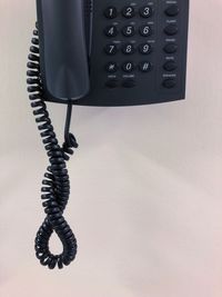 High angle view of telephone on table