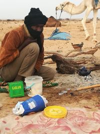 Man working on beach