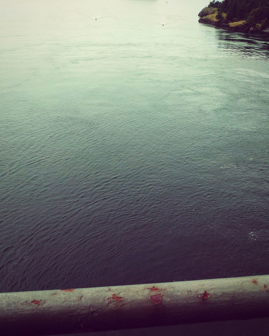 water, sea, high angle view, tranquility, rippled, pier, nature, tranquil scene, wood - material, beauty in nature, lake, jetty, beach, shore, day, outdoors, reflection, scenics, no people, railing