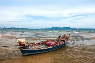 Fishing boat on the beach. pattaya beach, chonburi