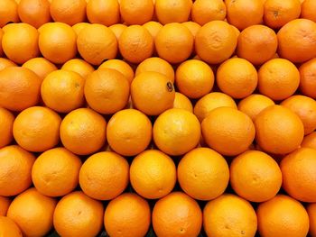 Full frame shot of oranges for sale at market