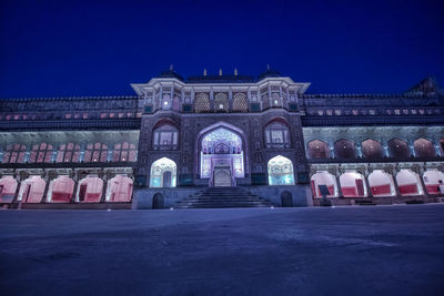 Facade of historic building at night