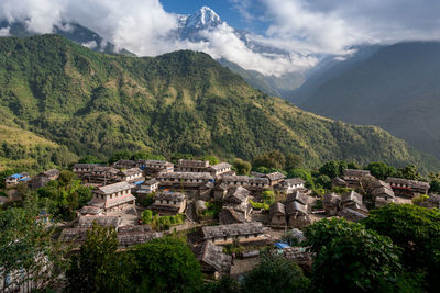 High angle view of castle on mountain against sky