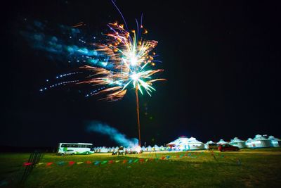 Firework display at night