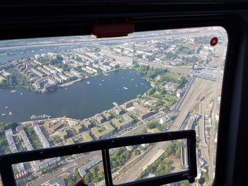 Aerial view of cityscape seen through window