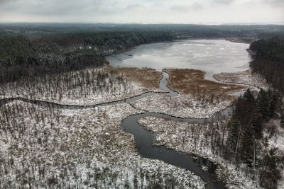 High angle view of land against sky during winter