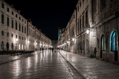 Panoramic view of illuminated city against sky at night