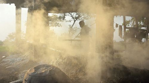 Man on foggy landscape