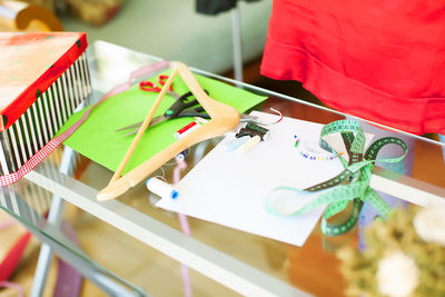 High angle view of multi colored paper on table