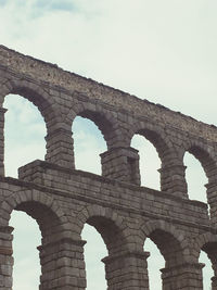 Low angle view of old ruins against sky