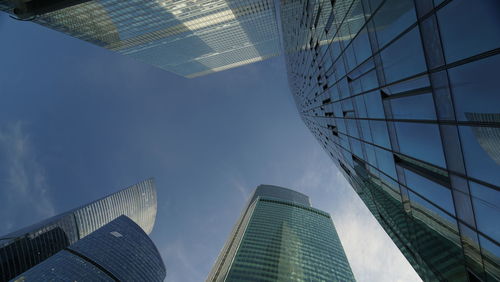 Low angle view of skyscraper against sky