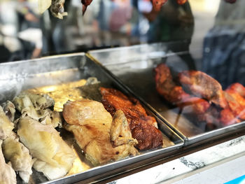 High angle view of meat on barbecue grill