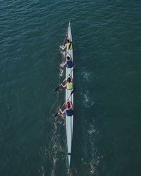 High angle view of people on boat in water