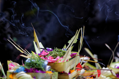 Close-up of religious offerings at temple