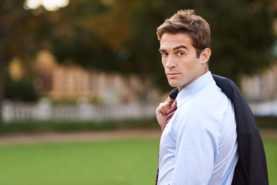 Young man standing outdoors