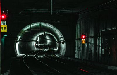 Train at railroad station at night