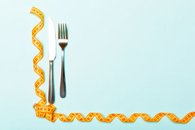 Close-up of birthday cake on table against white background