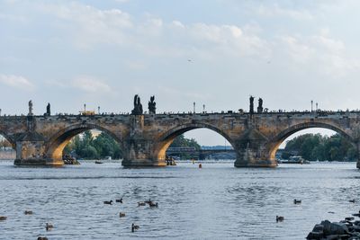 View of bridge over river against sky