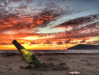 Scenic view of sea against sky at sunset