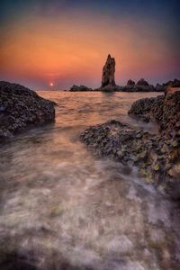 Scenic view of sea against sky during sunset