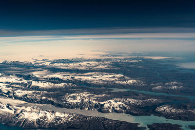 Aerial view of snow covered landscape