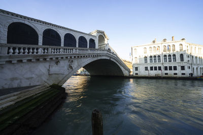 Arch bridge over river