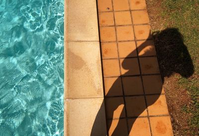 High angle view of shadow on swimming pool