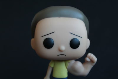 Close-up of stuffed toy against black background