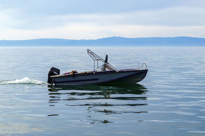 Motor boat on a lake without people