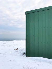 Scenic view of sea against sky during winter