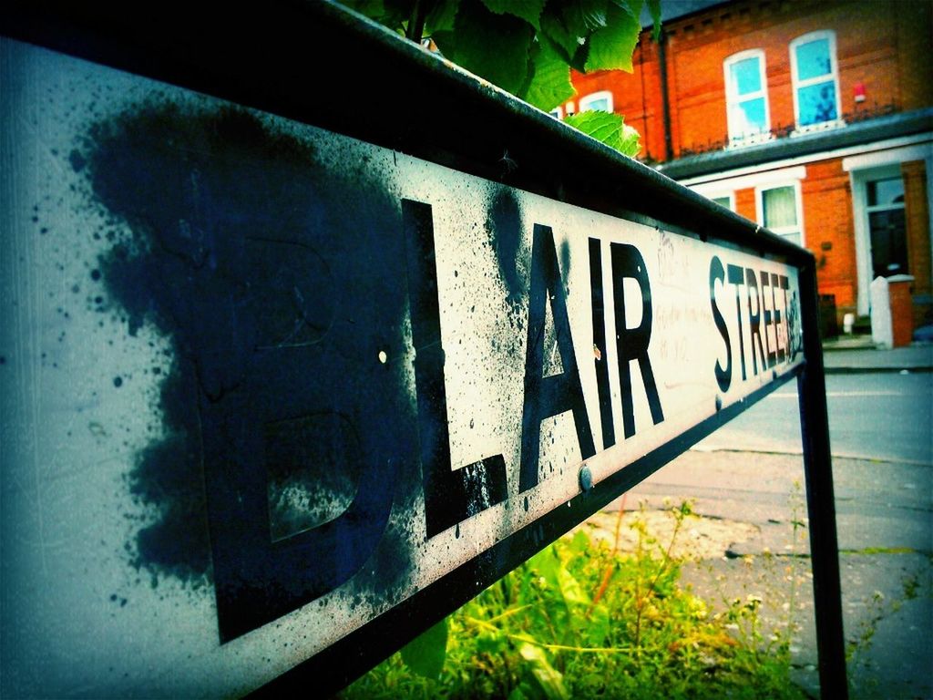 graffiti, built structure, architecture, text, building exterior, western script, wall - building feature, transportation, abandoned, communication, day, no people, outdoors, weathered, wall, sunlight, capital letter, damaged, building, run-down