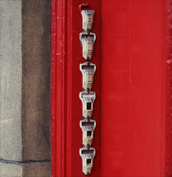 Close-up view of red wall