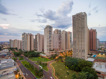 High angle view of buildings in city against sky