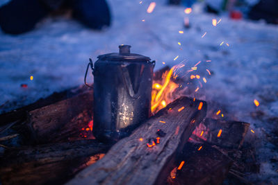 Close-up of fire burning at night