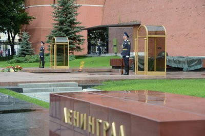 People in front of building