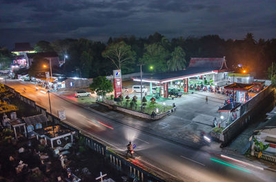 High angle view of light trails on road at night