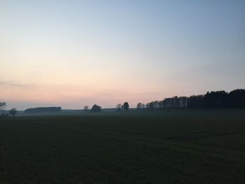 Scenic view of landscape at sunset