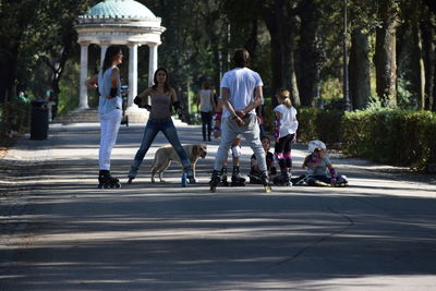 Group of people sitting at park